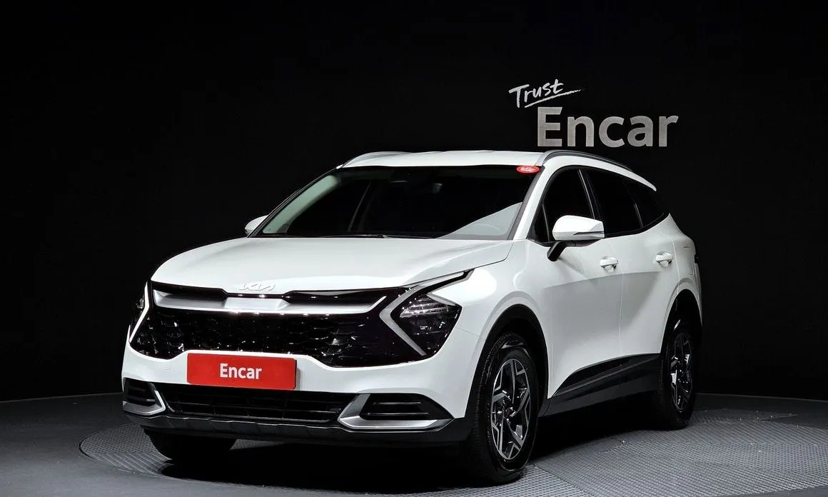 Kia Sportage — фото 1