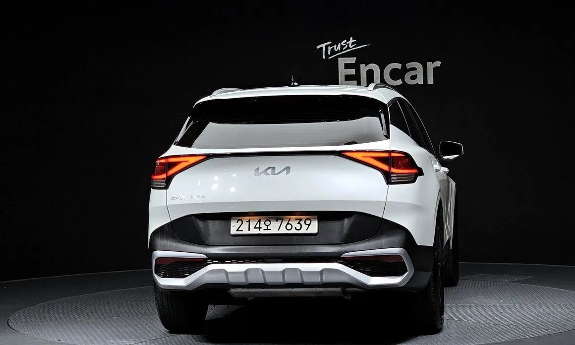 Kia Sportage — фото 7