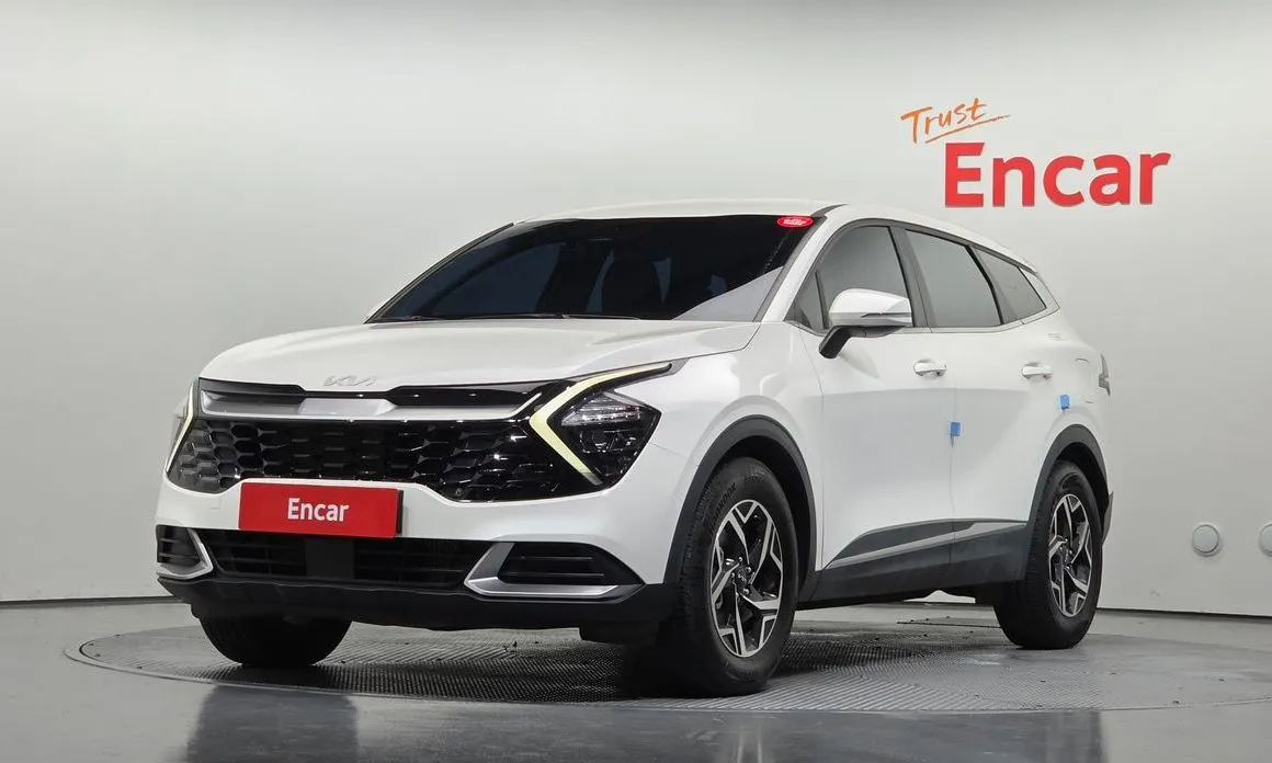 Kia Sportage — фото 1