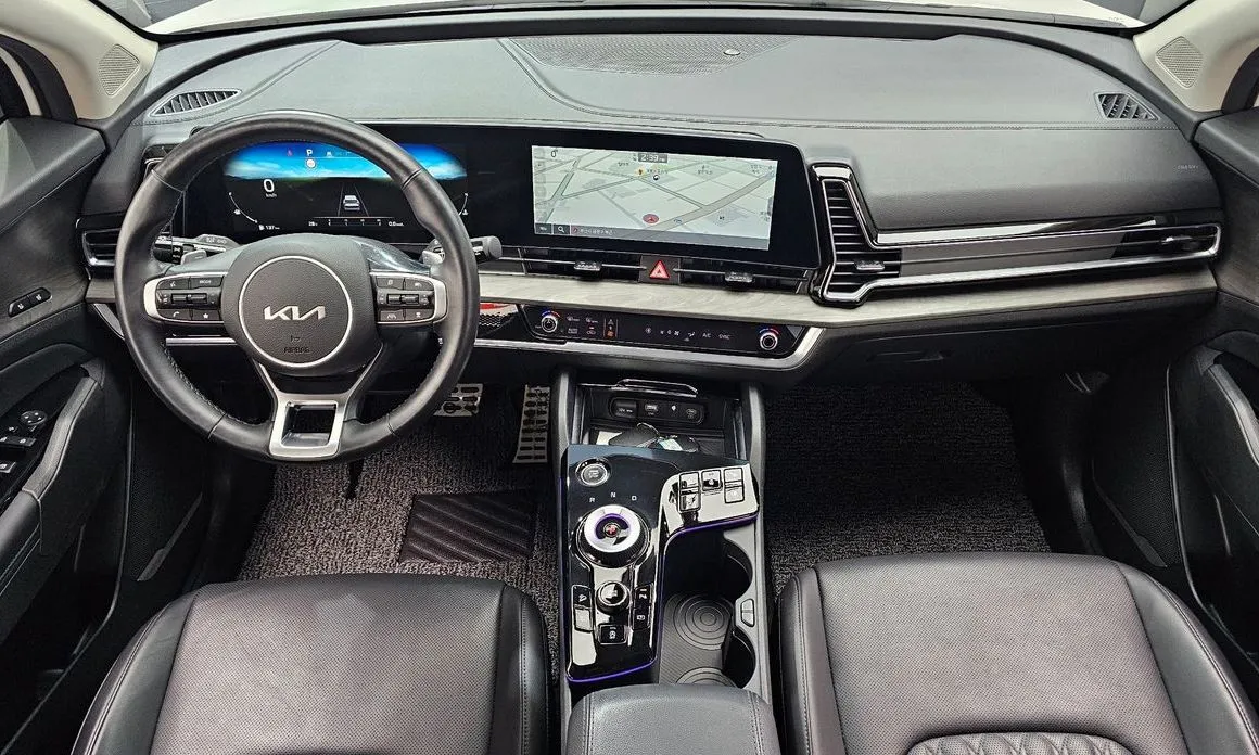 Kia Sportage — фото 10