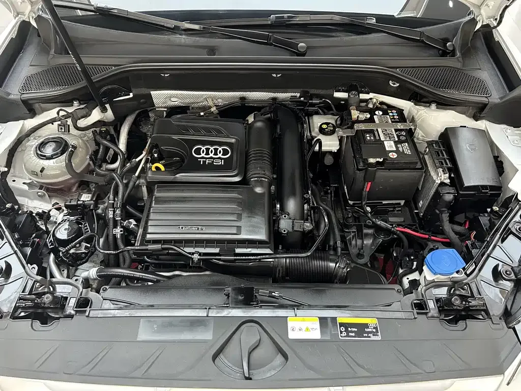 Audi Q2L — фото 10
