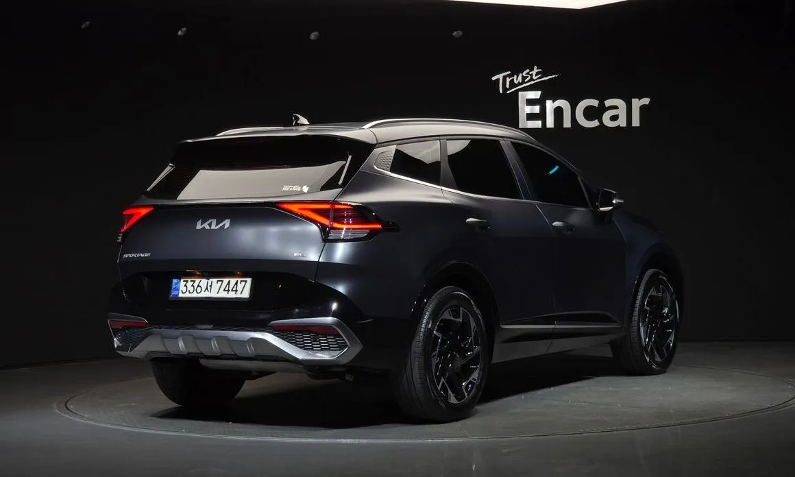 Kia Sportage — фото 8