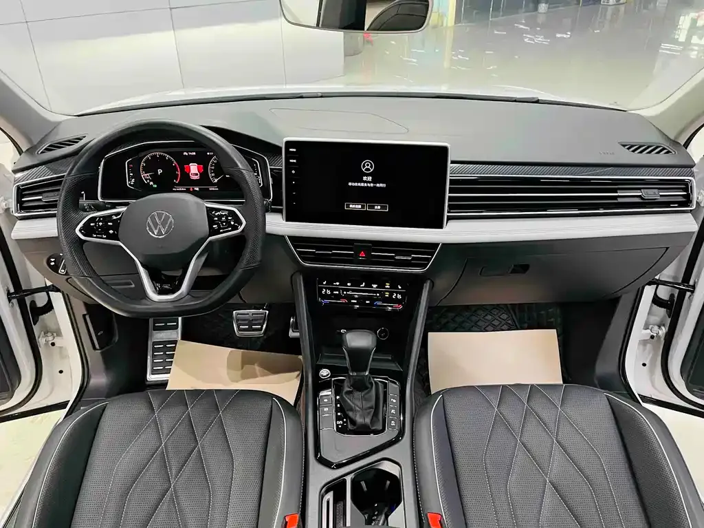 Volkswagen Tiguan L — фото 9
