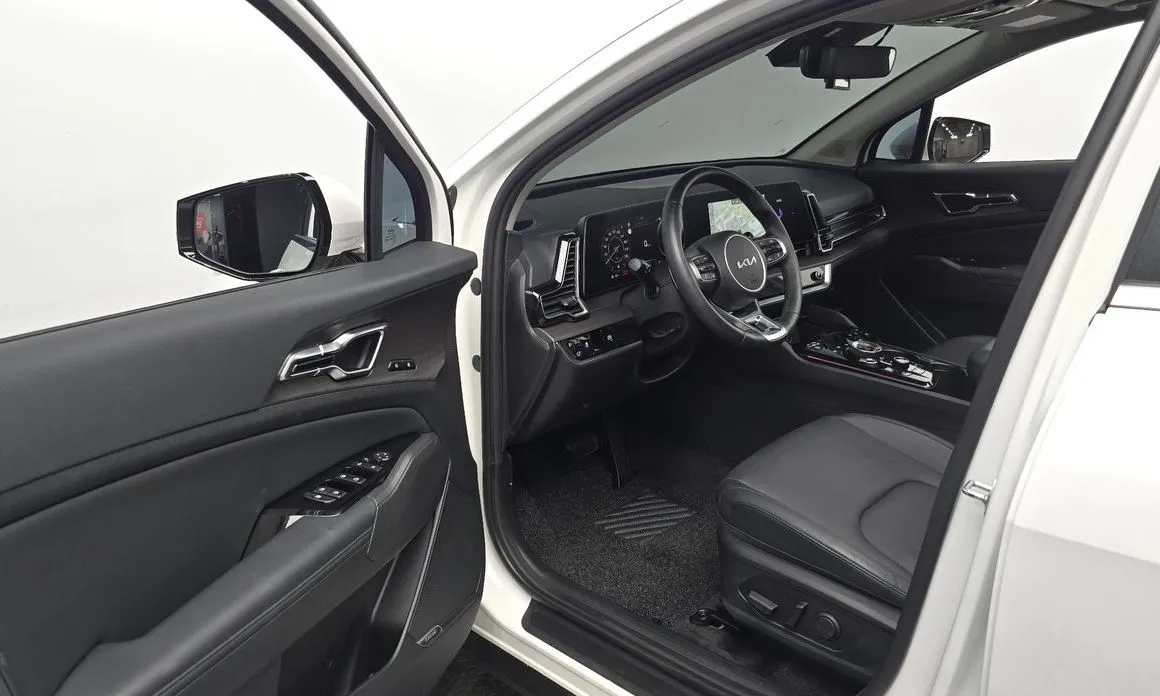 Kia Sportage — фото 7