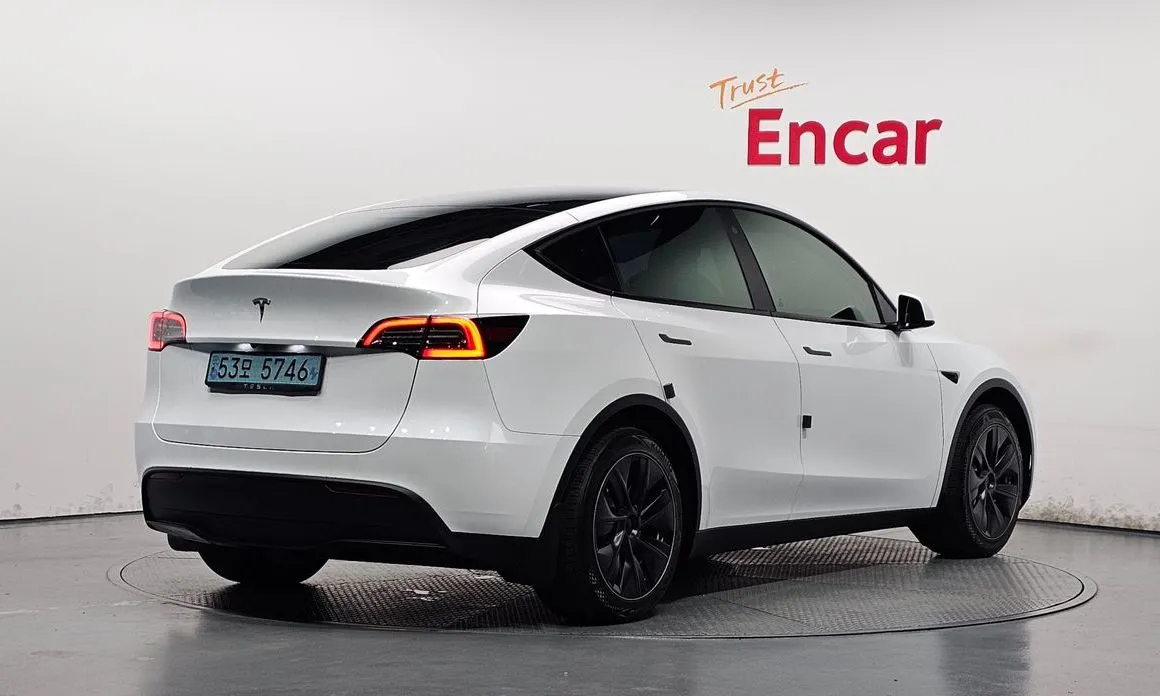 Tesla Model Y — фото 7