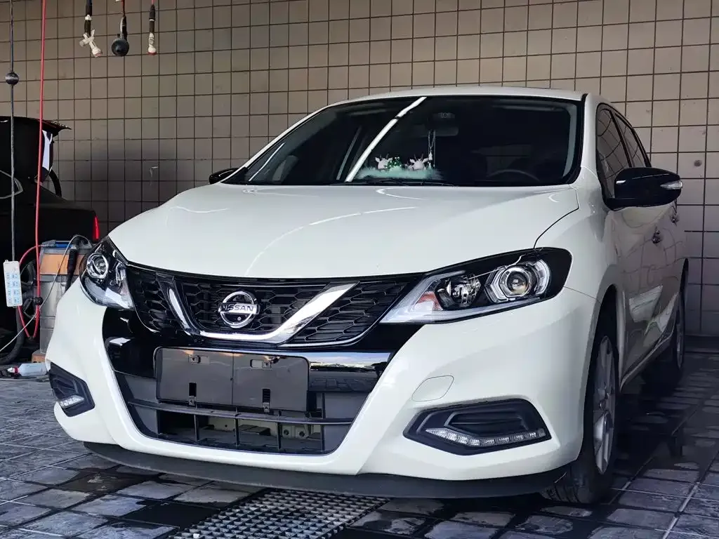 Nissan Tiida — фото 8