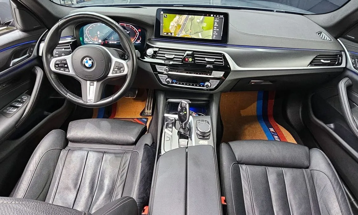 BMW 5-Series — фото 10