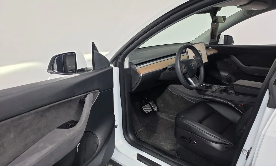 Tesla Model Y — фото 7