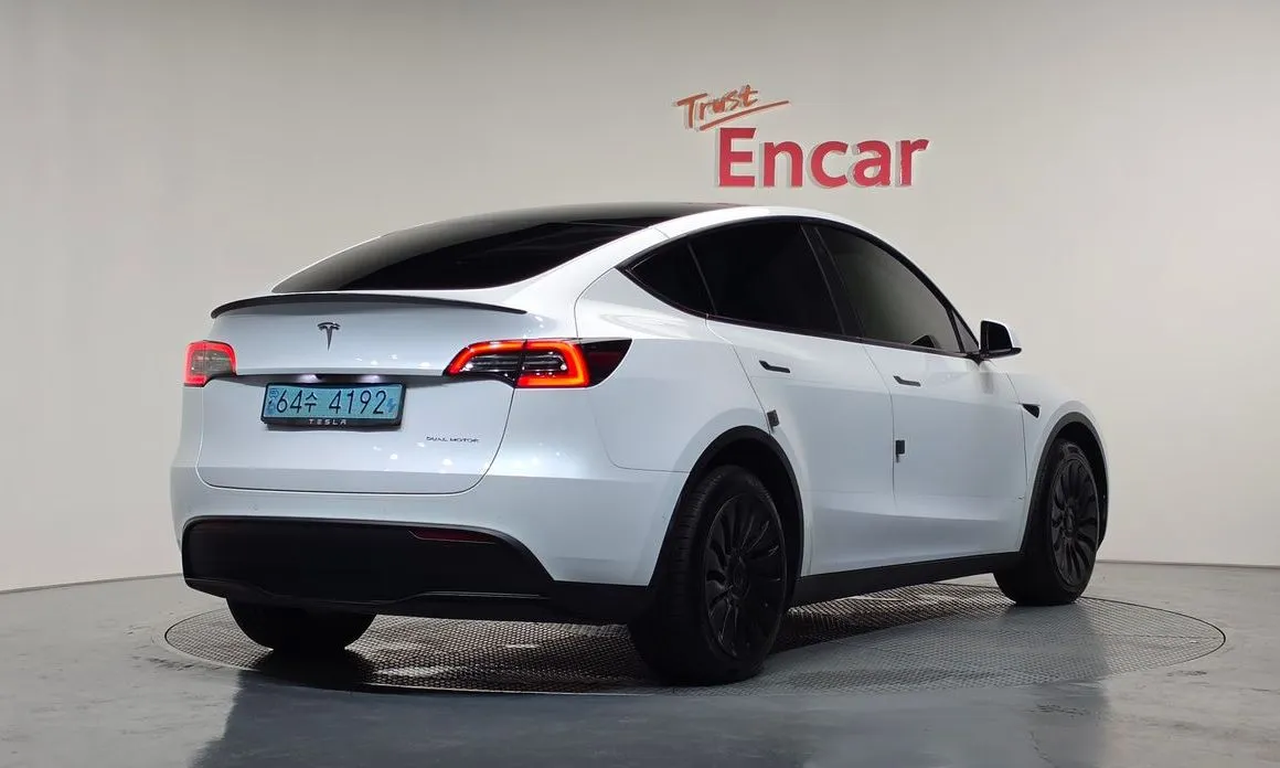 Tesla Model Y — фото 8