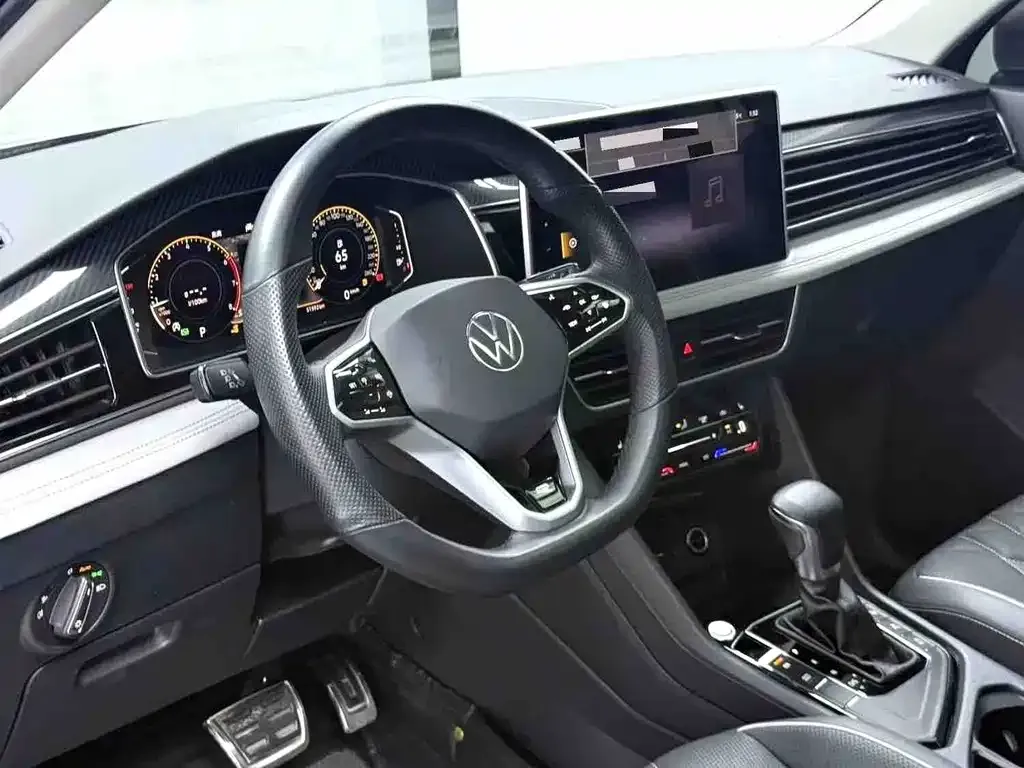 Volkswagen Tiguan L — фото 7
