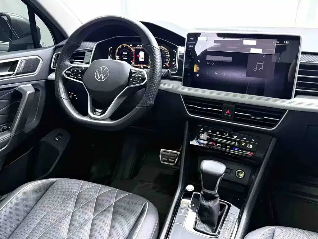 Volkswagen Tiguan L — фото 6