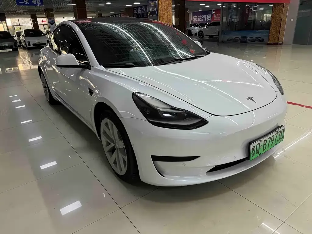Tesla Model 3 — фото 9