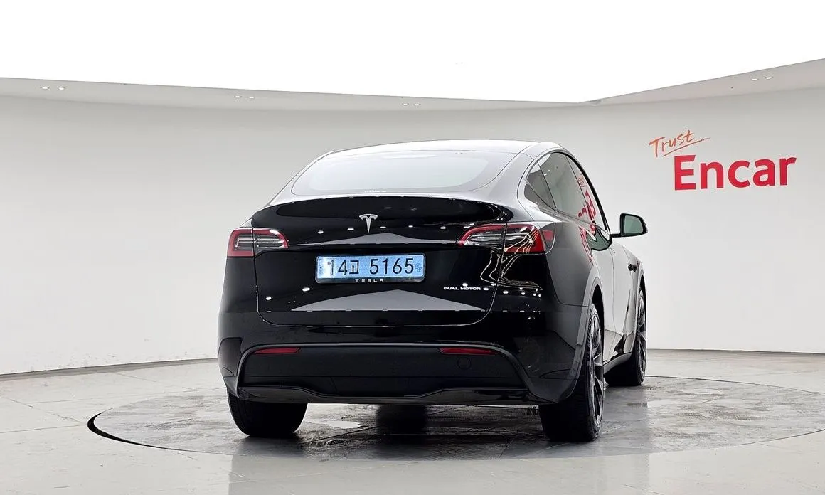 Tesla Model Y — фото 6