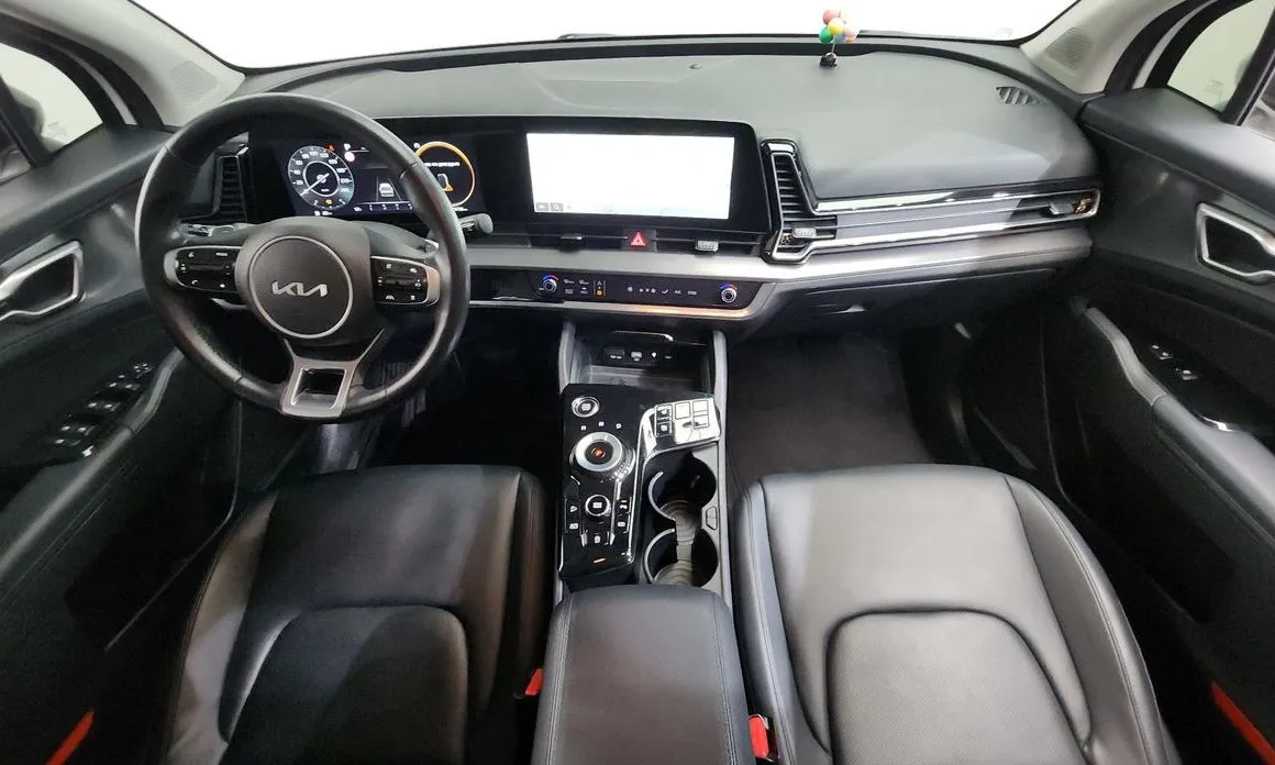 Kia Sportage — фото 9