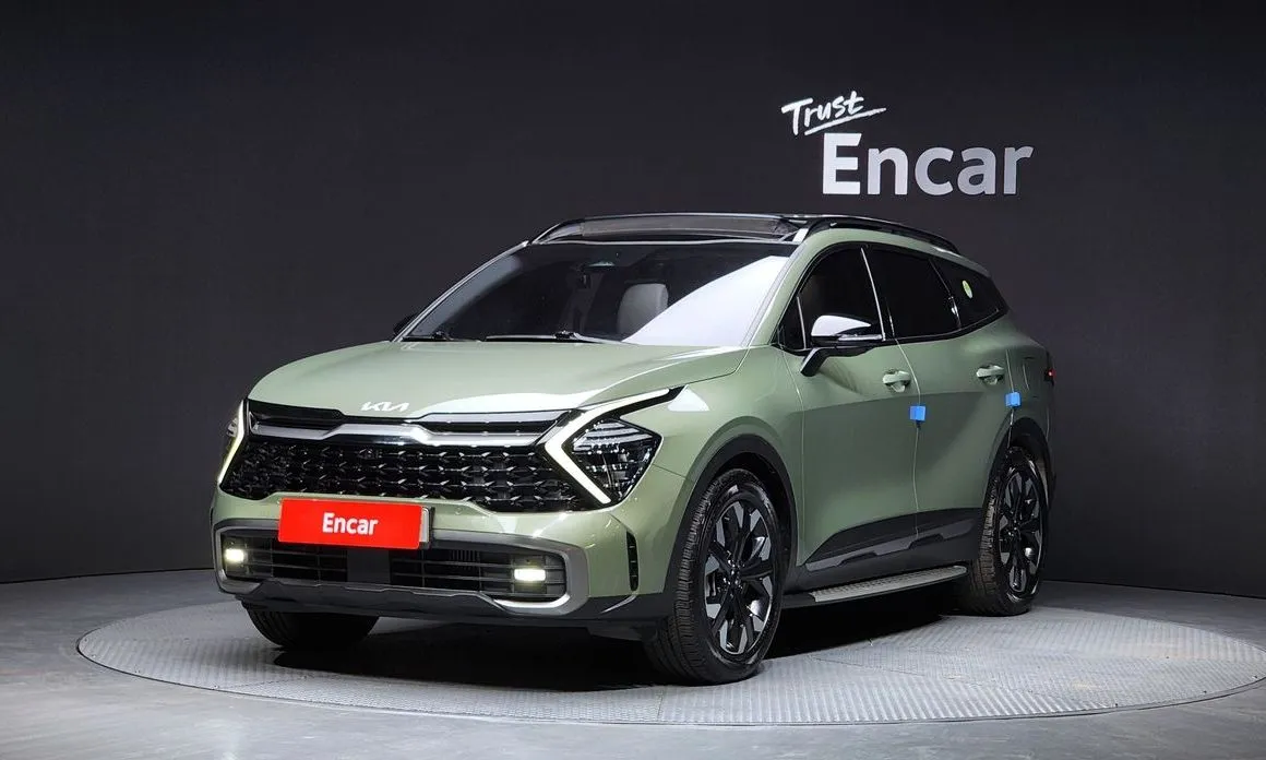 Kia Sportage — фото 1
