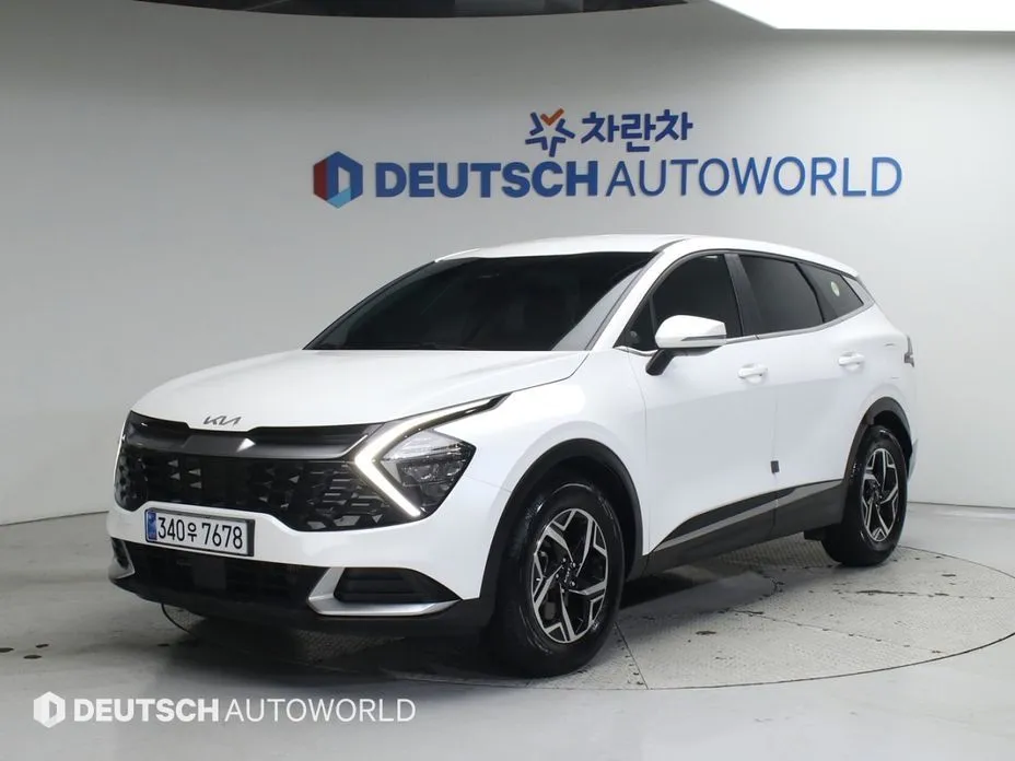 Kia Sportage — фото 1