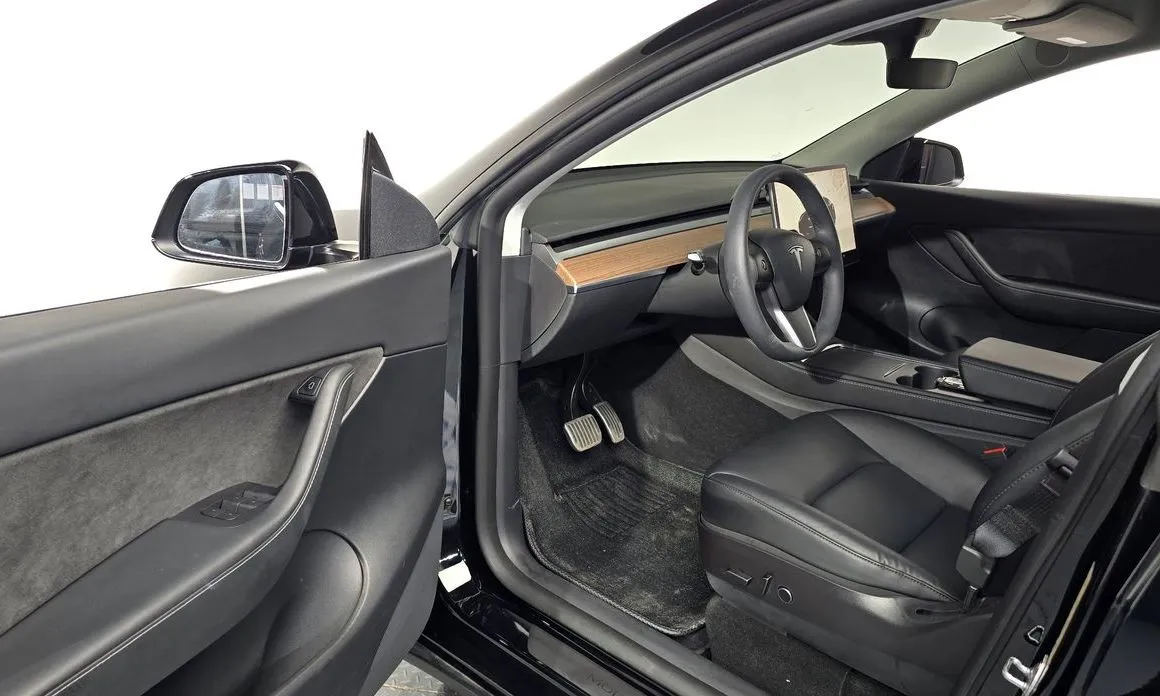 Tesla Model Y — фото 8