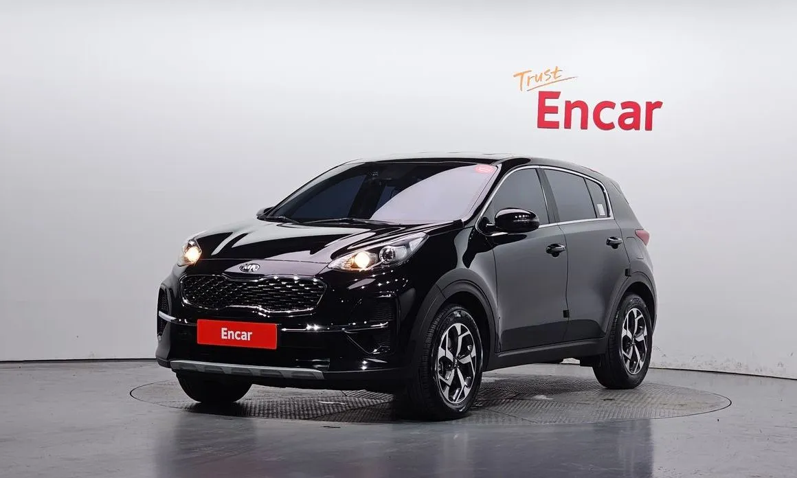 Kia Sportage — фото 1