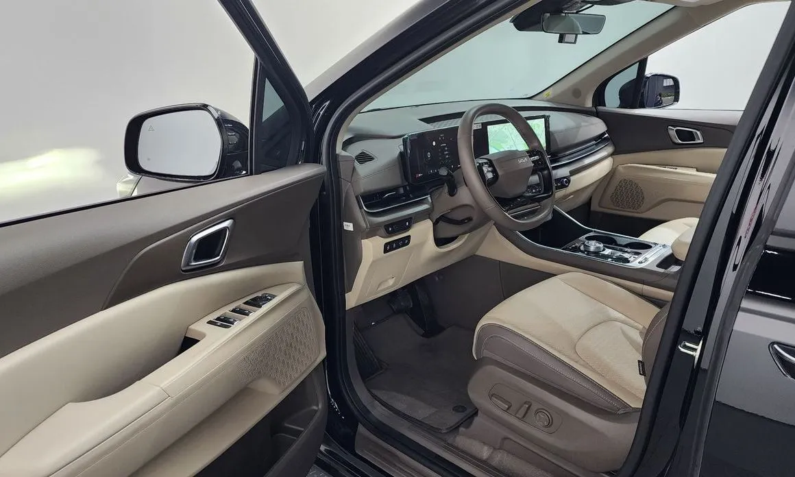 Kia Carnival — фото 10