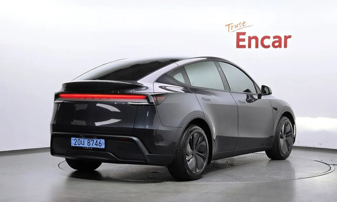 Tesla Model Y — фото 7