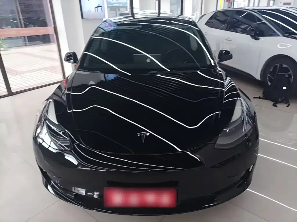 Tesla Model 3 — фото 10