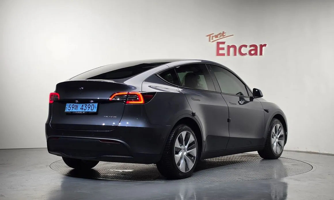 Tesla Model Y — фото 5
