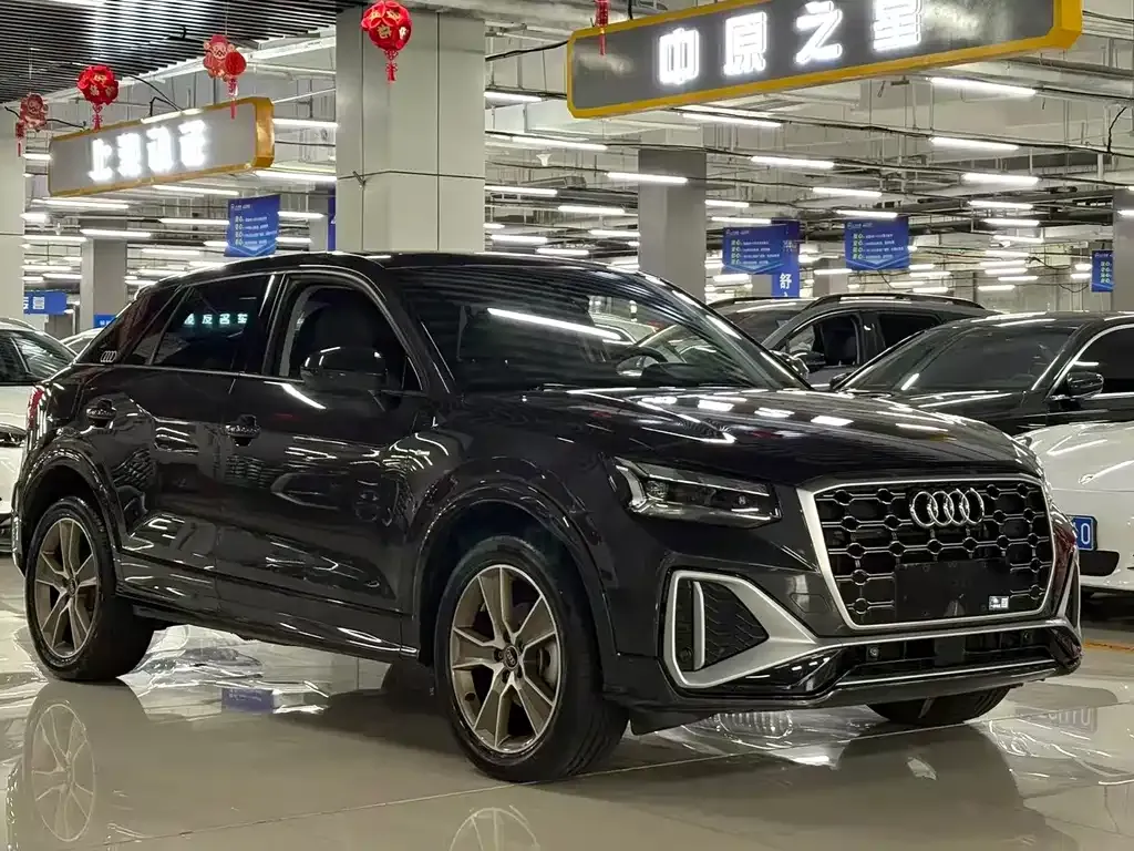 Audi Q2L — фото 5