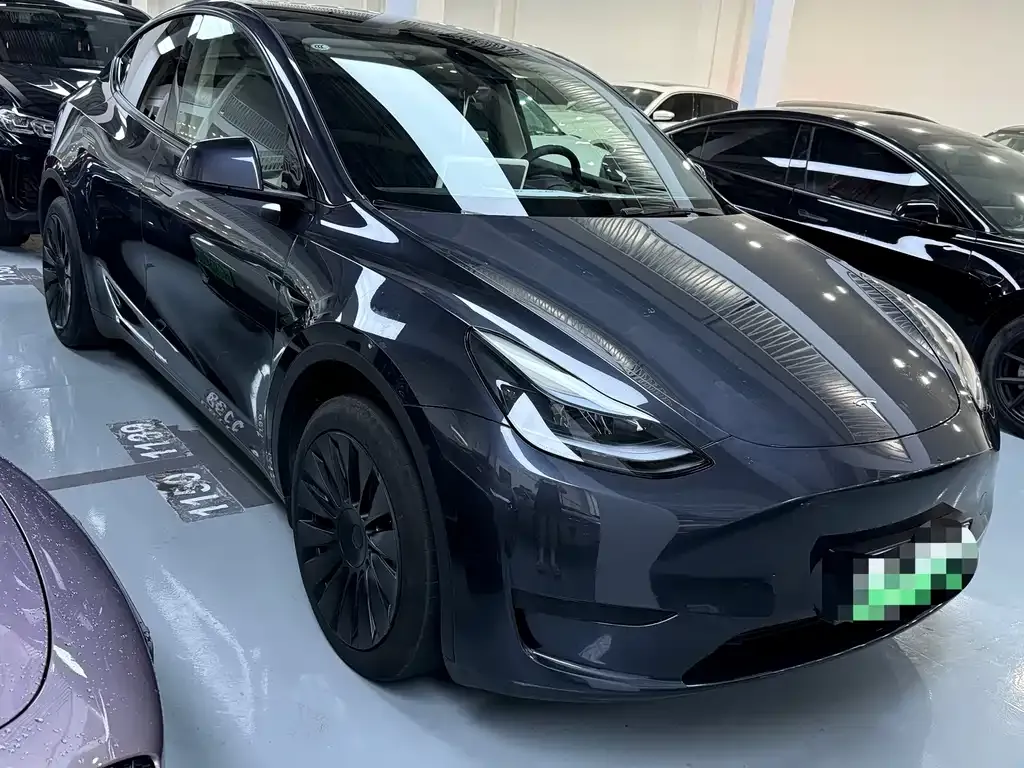Tesla Model Y — фото 7