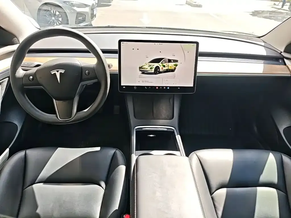 Tesla Model 3 — фото 7
