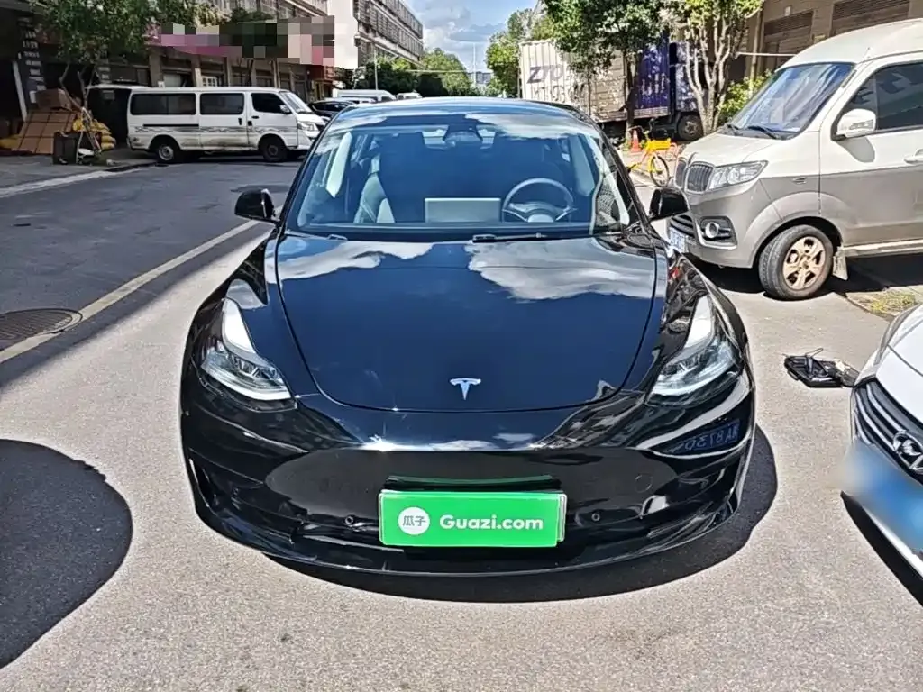 Tesla Model 3 — фото 9