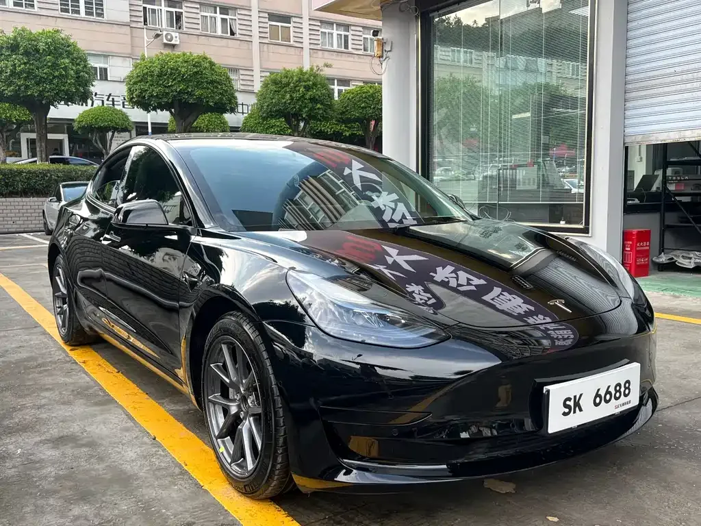 Tesla Model 3 — фото 5