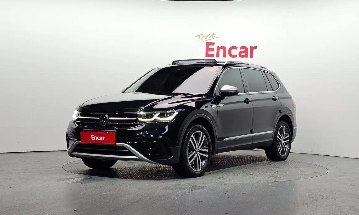 Volkswagen Tiguan — фото 1