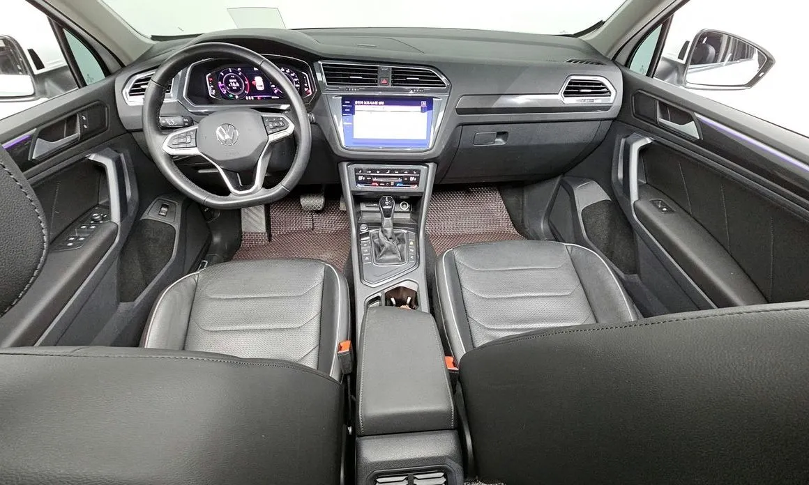 Volkswagen Tiguan — фото 7