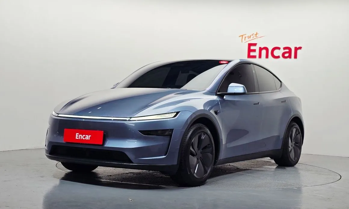 Tesla Model Y — фото 1