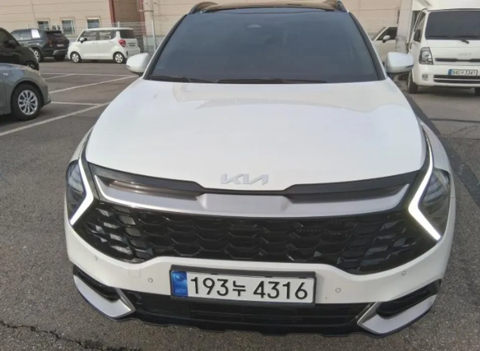 Kia Sportage — фото 1