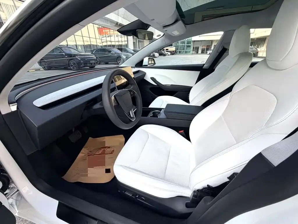 Tesla Model 3 — фото 5