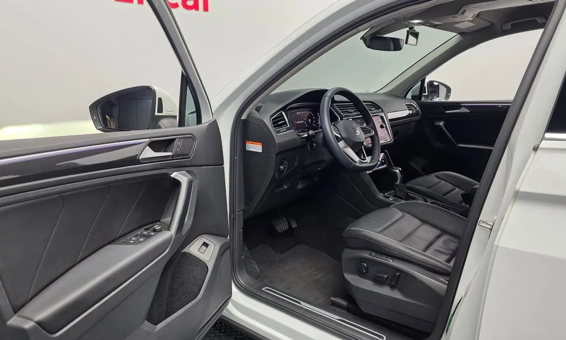Volkswagen Tiguan — фото 7