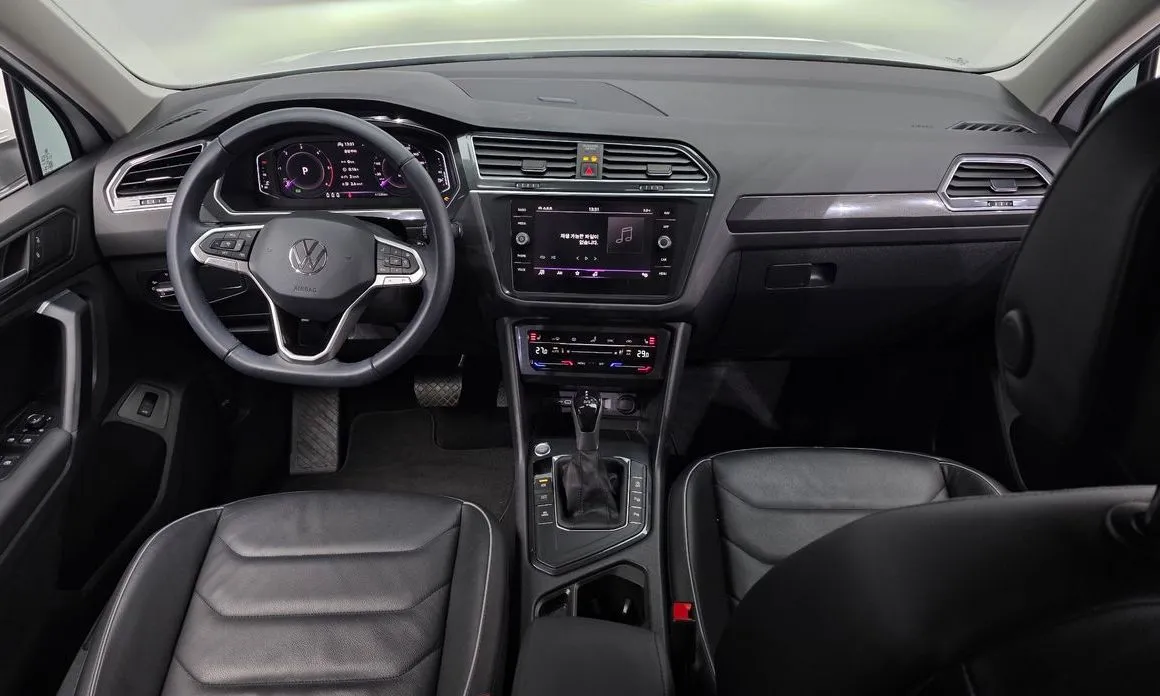 Volkswagen Tiguan — фото 9