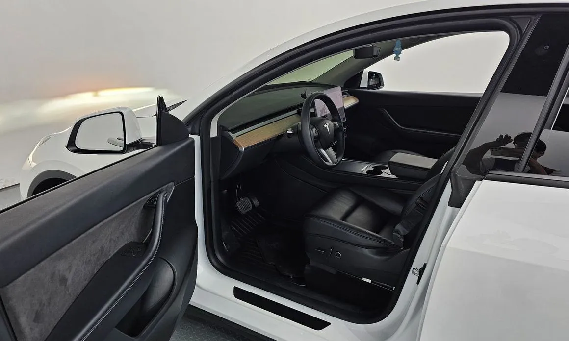 Tesla Model Y — фото 8