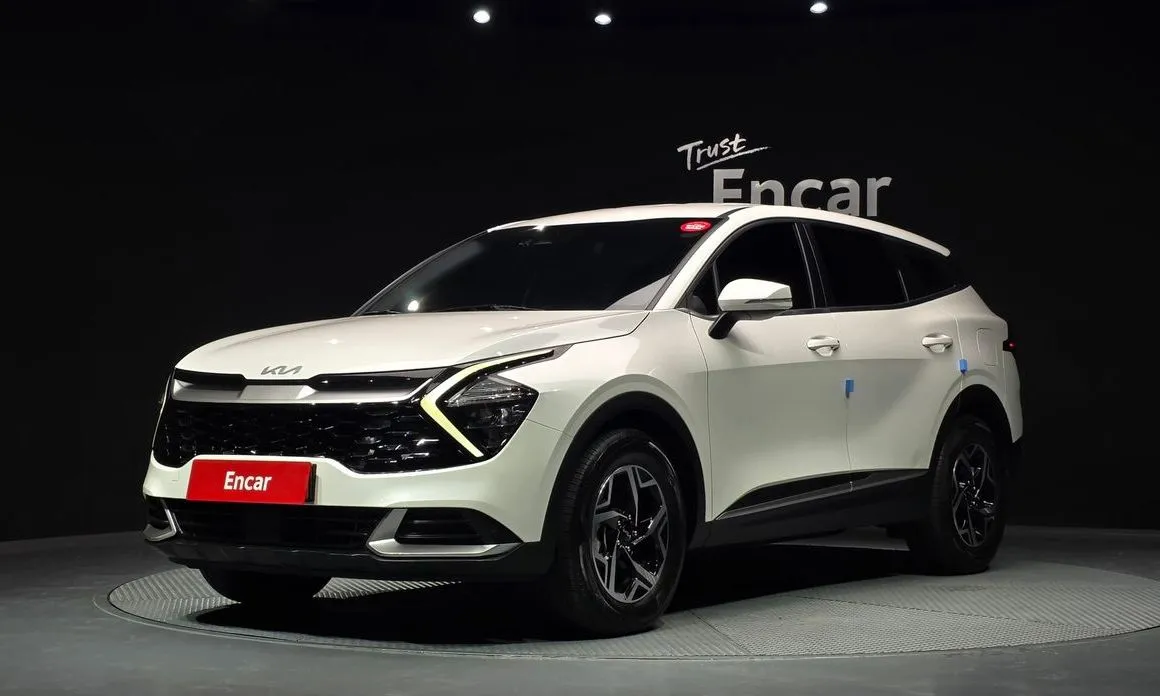 Kia Sportage — фото 1