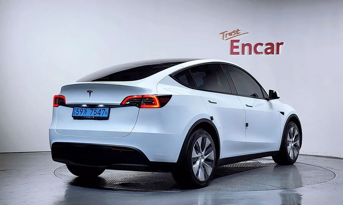 Tesla Model Y — фото 4