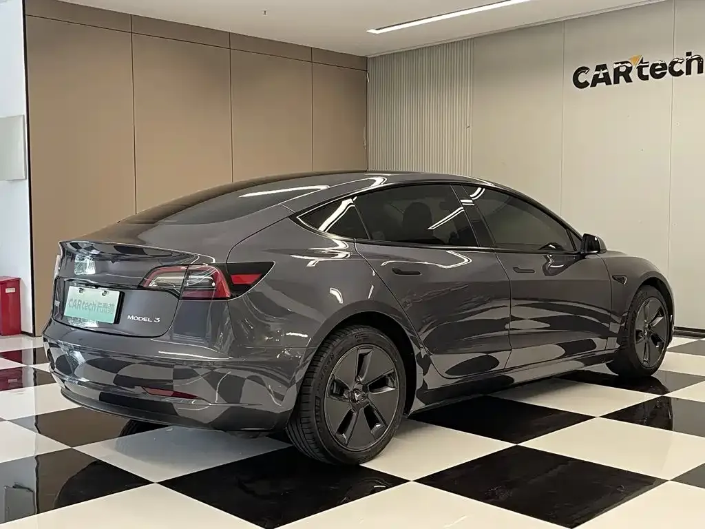 Tesla Model 3 — фото 9