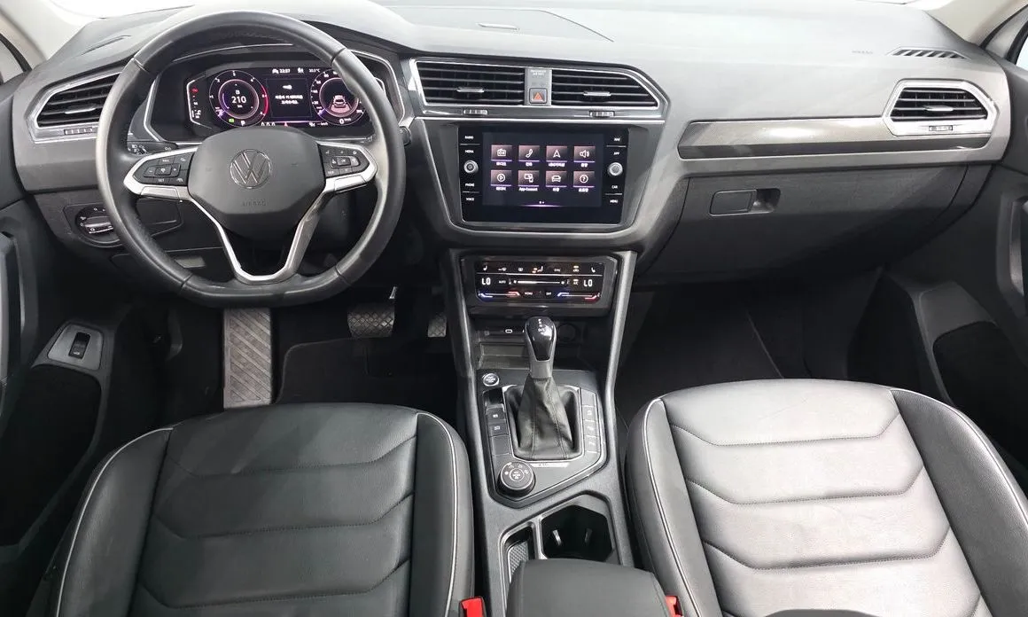 Volkswagen Tiguan — фото 9