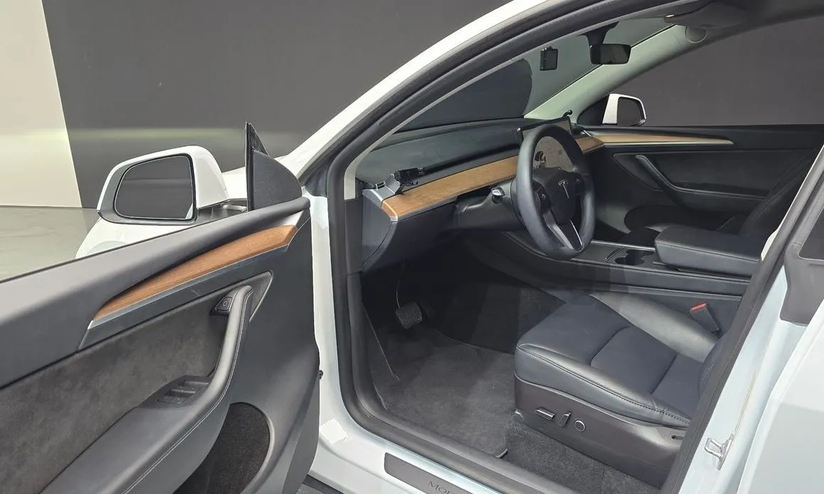 Tesla Model Y — фото 6