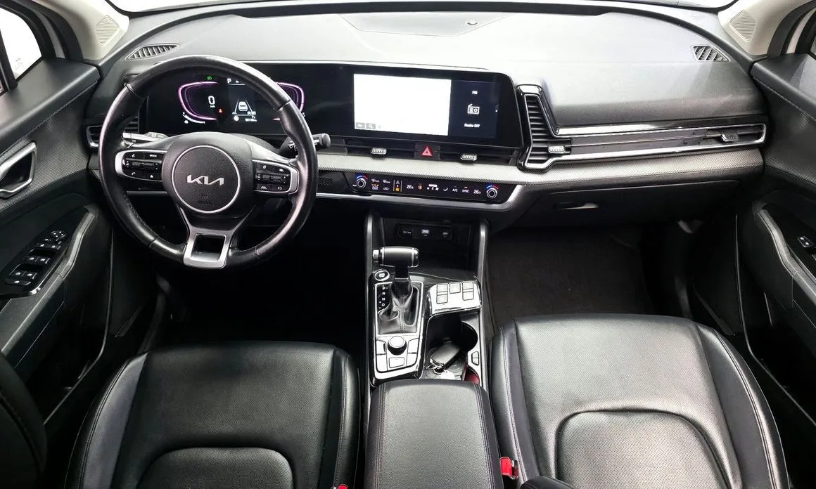 Kia Sportage — фото 8