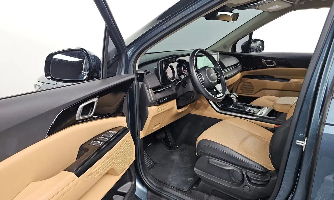 Kia Carnival — фото 10