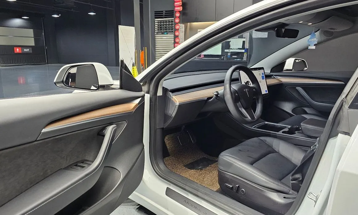 Tesla Model 3 — фото 9