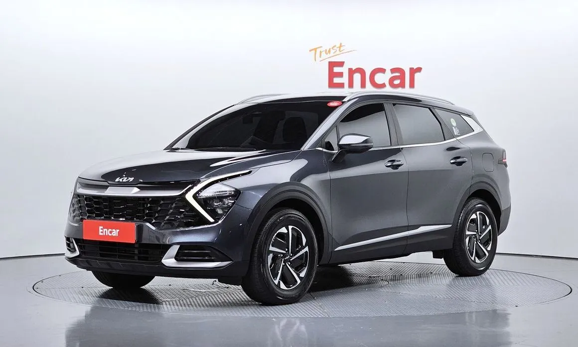 Kia Sportage — фото 1