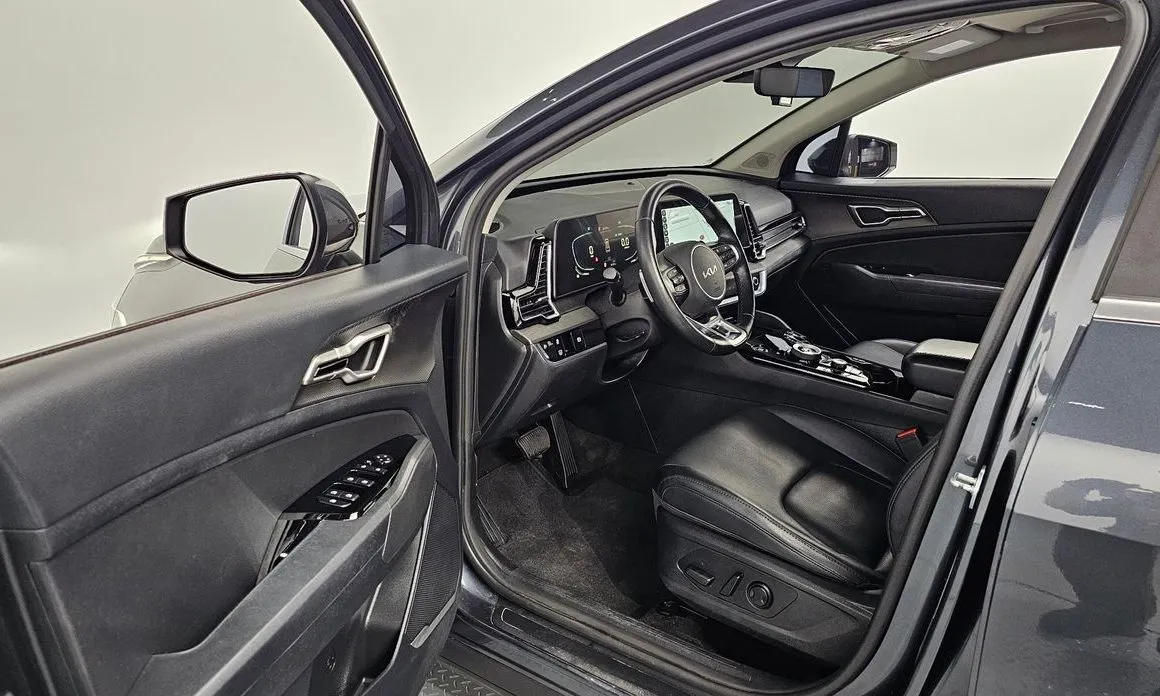 Kia Sportage — фото 10