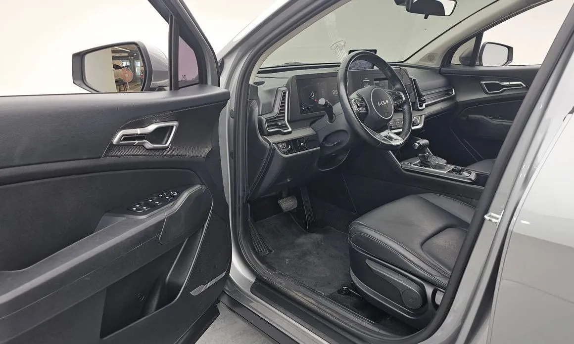 Kia Sportage — фото 10